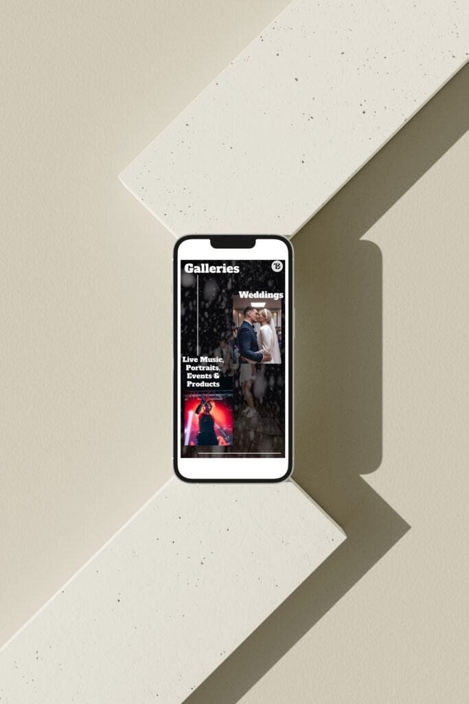 Mobile phone displaying a photography website's gallery section, featuring categories such as 'Weddings' and 'Live Music, Portraits, Events & Products.' The phone is placed on a geometric, beige background